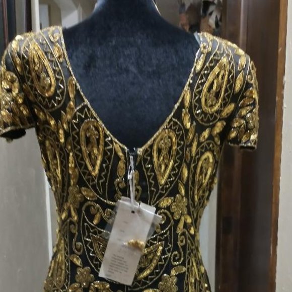 Raiment Fashions, Inc.  Gorgeous Black and Gold  size Large woman's evening gown - Picture 3 of 3